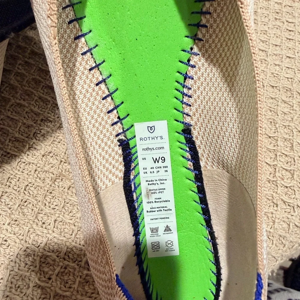 Rothy's Beige and Black Flats with Blue Trim